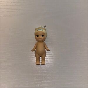 Sonny Angel Collectible Doll with Cream 'Sugar' Cap